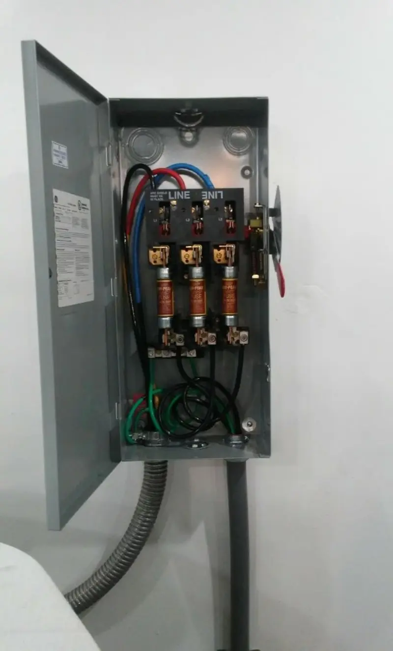 Three-phase disconnect switch installed for Smoke Detector Installation in McCall